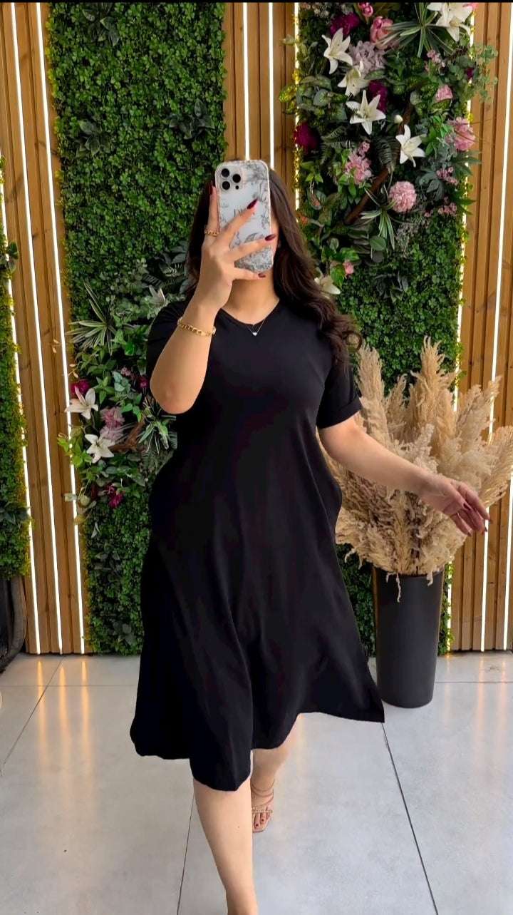 Modern Women's Short Sleeve Flowy Pocketlong Top