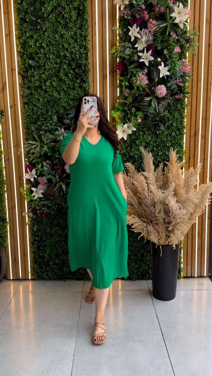 Modern Women's Short Sleeve Flowy Pocketlong Top